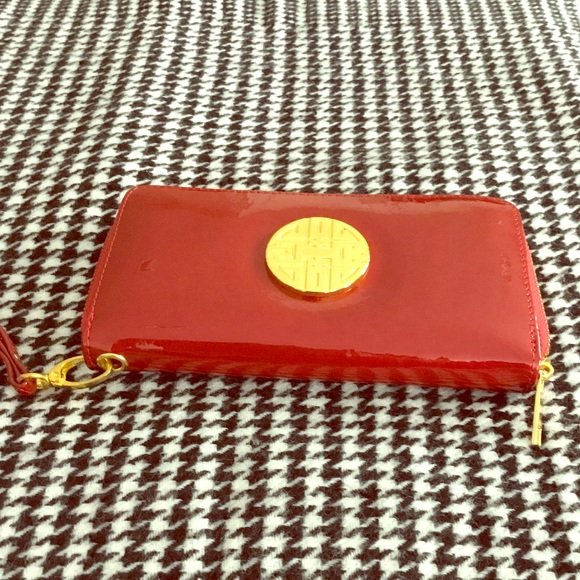 Handbags - Patent leather wristlet.